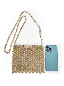 Detailed view of a golden sunflower hollow-out metal crossbody bag with a chain strap