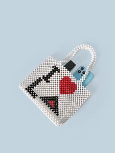Handmade beaded tote bag with heart and letter pattern including phone and lipstick