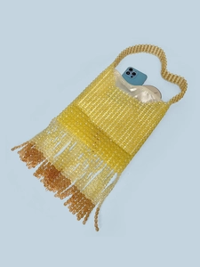 Handmade beaded fringe bag in yellow and amber colors with metallic lining and beads