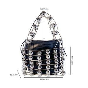 Silver hollow metal sphere cage handbag with black drawstring liner and dimensions