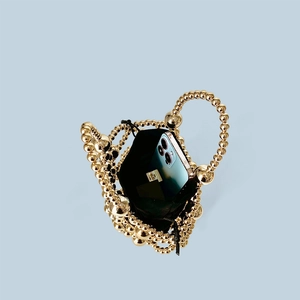 Top view of gold beaded evening bag showing capacity for an iPhone and drawstring liner