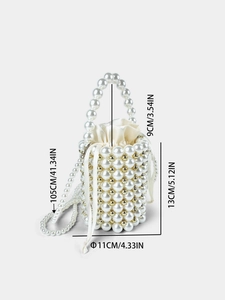 Handmade pearl bucket bag with ivory beads, gold accents and detachable shoulder strap