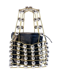Modern geometric handbag with gold metal cage and silver spheres over black leather