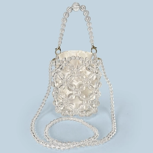 Detail of beaded bucket bag featuring clear floral acrylic beads and drawstring satin pouch