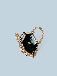 Elegant gold beaded handbag with black drawstring liner and glossy metallic finish