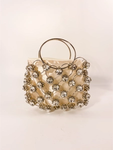 Elegant champagne gold evening handbag with luxury crystal mesh and metal ring handles