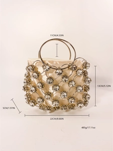 Detailed view of beaded evening clutch with crystal mesh and metal ring handle