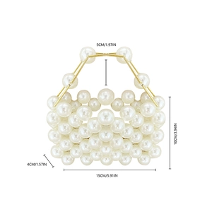 Detailed dimensions of pearl beaded handbag with golden metal handle in centimeters and inches