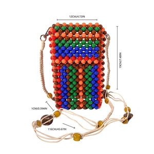 Detail view of handmade beaded phone bag with 12x19x1cm dimensions and colorful pattern