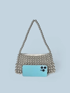 Silver beaded handmade woven shoulder bag with zipper closure and metallic finish