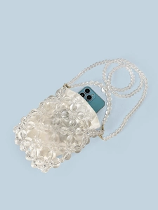 Handmade clear acrylic beaded crossbody bucket bag with white satin drawstring pouch inside
