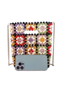 Colorful handmade beaded crossbody bag with geometric patterns and metal chain strap