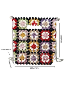 Colorful handmade beaded crossbody bag with floral patterns and silver chain strap