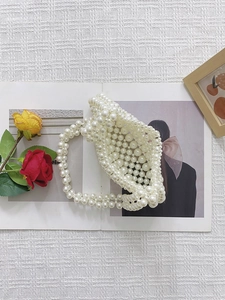 Handmade woven pearl beaded shoulder bag for women in elegant creamy white finish