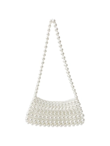 Detailed view of handmade white pearl woven texture and large beaded shoulder strap