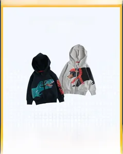 Detail of zip-up hoodies for boys featuring dinosaur and bear prints in navy and grey
