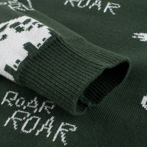 Dark green knitted sweater for boys with white ROAR lettering and ribbed cuffs