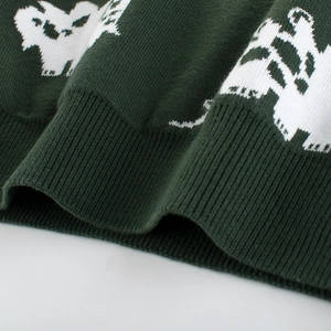 Dark green knitted sweater for boys featuring white dinosaur patterns and ribbed cuffs