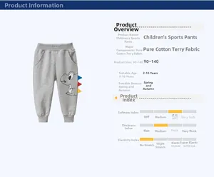 Détail du pantalon de sport gris pour enfants en coton avec motifs de dinosaures verts