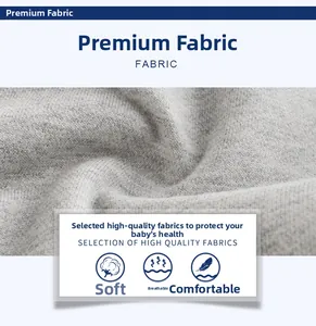 Gros plan du tissu en coton gris doux pour pantalon enfant montrant la maille respirante