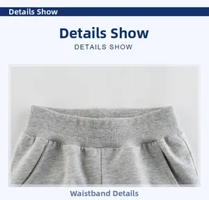 Détails du pantalon de jogging gris avec taille élastique côtelée et poches inclinées