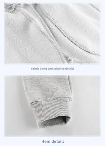 Detail of soft fleece lining and elastic ribbed cuffs on grey thermal kids' pants