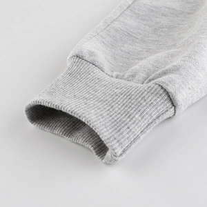 Pantalon de sport gris pour enfants avec poignets côtelés et doublure en micropolaire