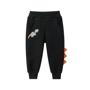Boys black cotton sports pants with dinosaur embroidery and orange side 3D fin details