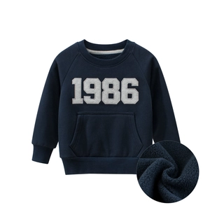Kids navy blue 1986 sweatshirt with kangaroo pocket and warm fleece lining detail
