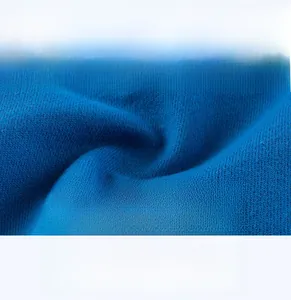 Detailed close-up of blue soft cotton knit fabric for breathable kids' summer shorts