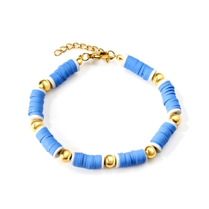 Bracciale con perline heishi blu con accenti dorati e chiusura a moschettone regolabile