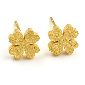 Minimalist gold plated clover stud earrings with a refined matte sandblasted finish