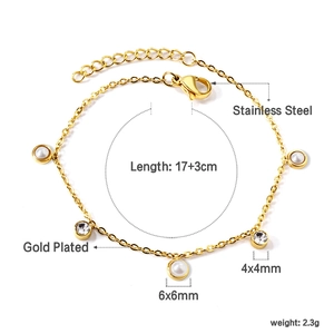 Détails du bracelet en acier inoxydable plaqué or avec perles blanches et cristaux