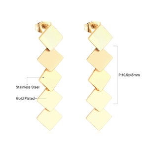 Detail view of gold-plated geometric square tassel earrings with 10.5x46mm dimensions