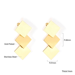 Detail of 48mm gold-plated stainless steel geometric earrings with triple square drop design