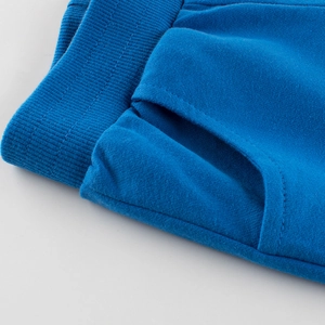 Blue solid kids cotton shorts with ribbed elastic waistband and pockets macro view