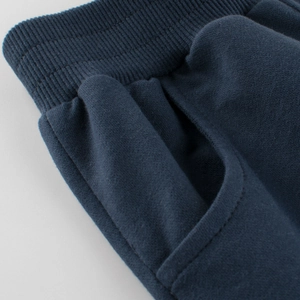 Dark blue knit cotton shorts for boys with elastic ribbed waistband and side pockets
