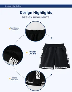 Detailed views of boys' black sports shorts with elastic waist and graphic print details