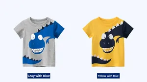 Detail view of cotton kids t-shirts featuring cartoon dinosaur prints in grey and yellow
