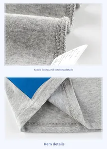 Detailed view of gray knit fabric showing inner seams and double-needle hem stitching