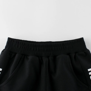 Boy's black elastic waist sports shorts with side letter printing and pockets
