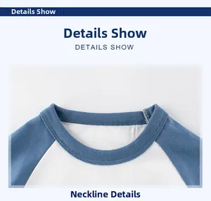 Detail view of the ribbed crew neck and clean stitching on children raglan sleeve t-shirt