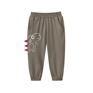 Boy's summer mosquito pants in dark taupe with white dinosaur print and 3D red spikes