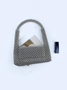 Silver metallic beaded handbag with handmade round beads and top handle for party fashion