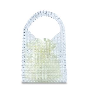 Detail of transparent beaded handbag with cream satin drawstring lining for summer holidays
