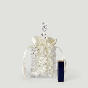 Detail of colorful acrylic beaded floral handbag with satin drawstring lining pouch