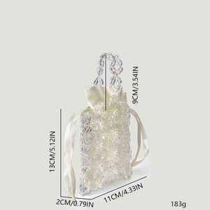 Detail view of floral acrylic beads and pearl weave with size measurements in cm and inch