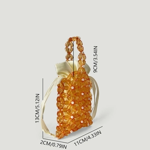 Detail view of amber acrylic flower beaded bag with dimensions in CM and IN