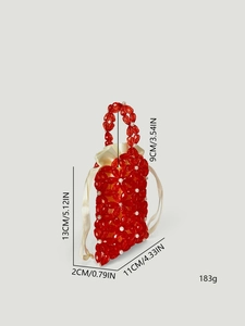 Detail view of red floral acrylic beadwork bag with drawstring lining and size markers