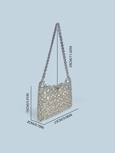 Silver beaded shoulder bag with bamboo style weaving and geometric hollow pattern